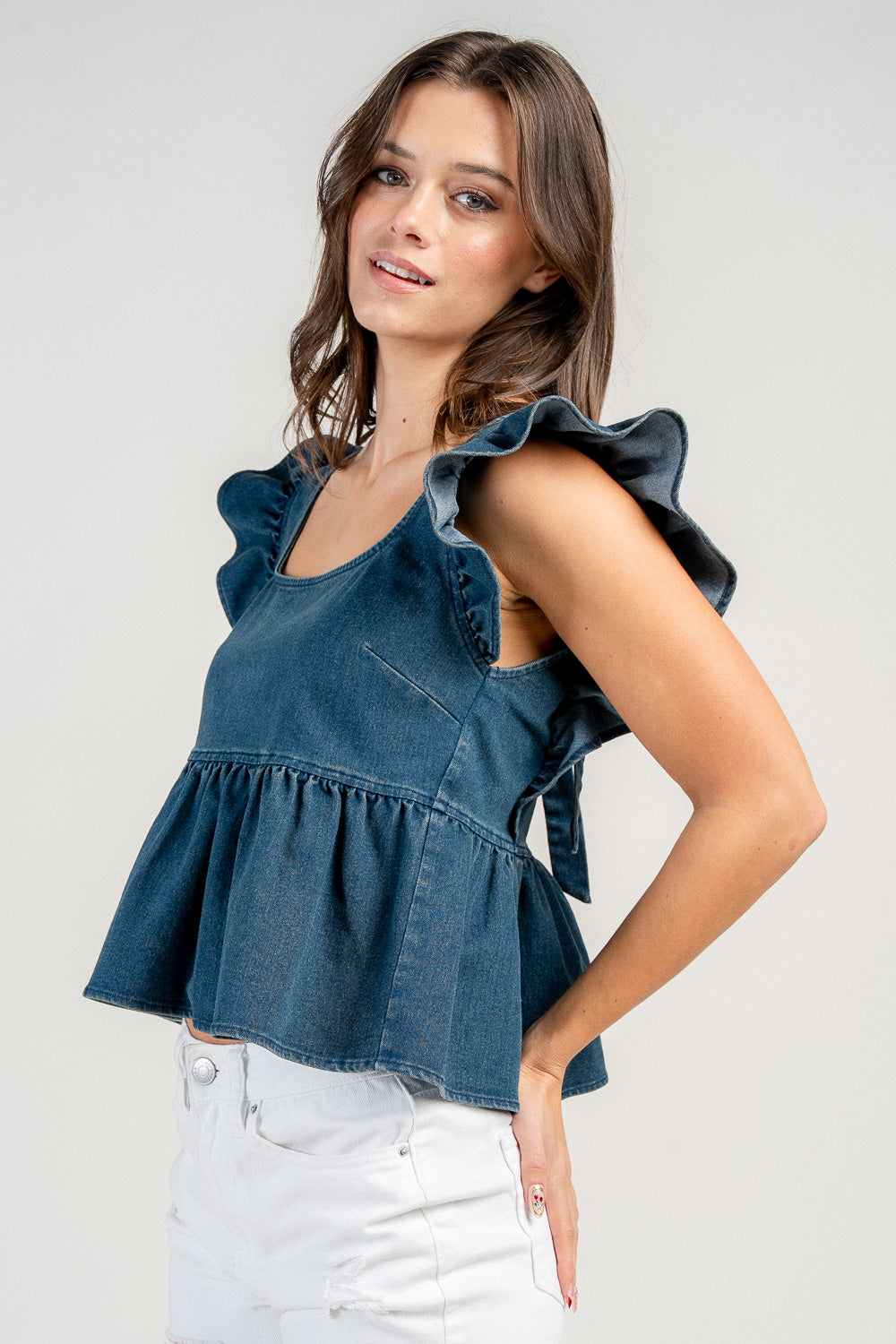 PEPLUM TOP W/ RUFFLE SHOULDER