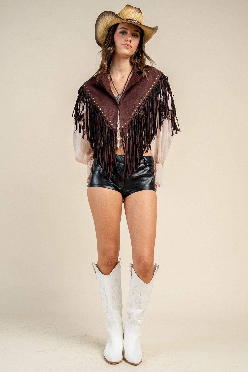 A BLANKET-STYLE WRAP JACKET WITH A STAR PATCH