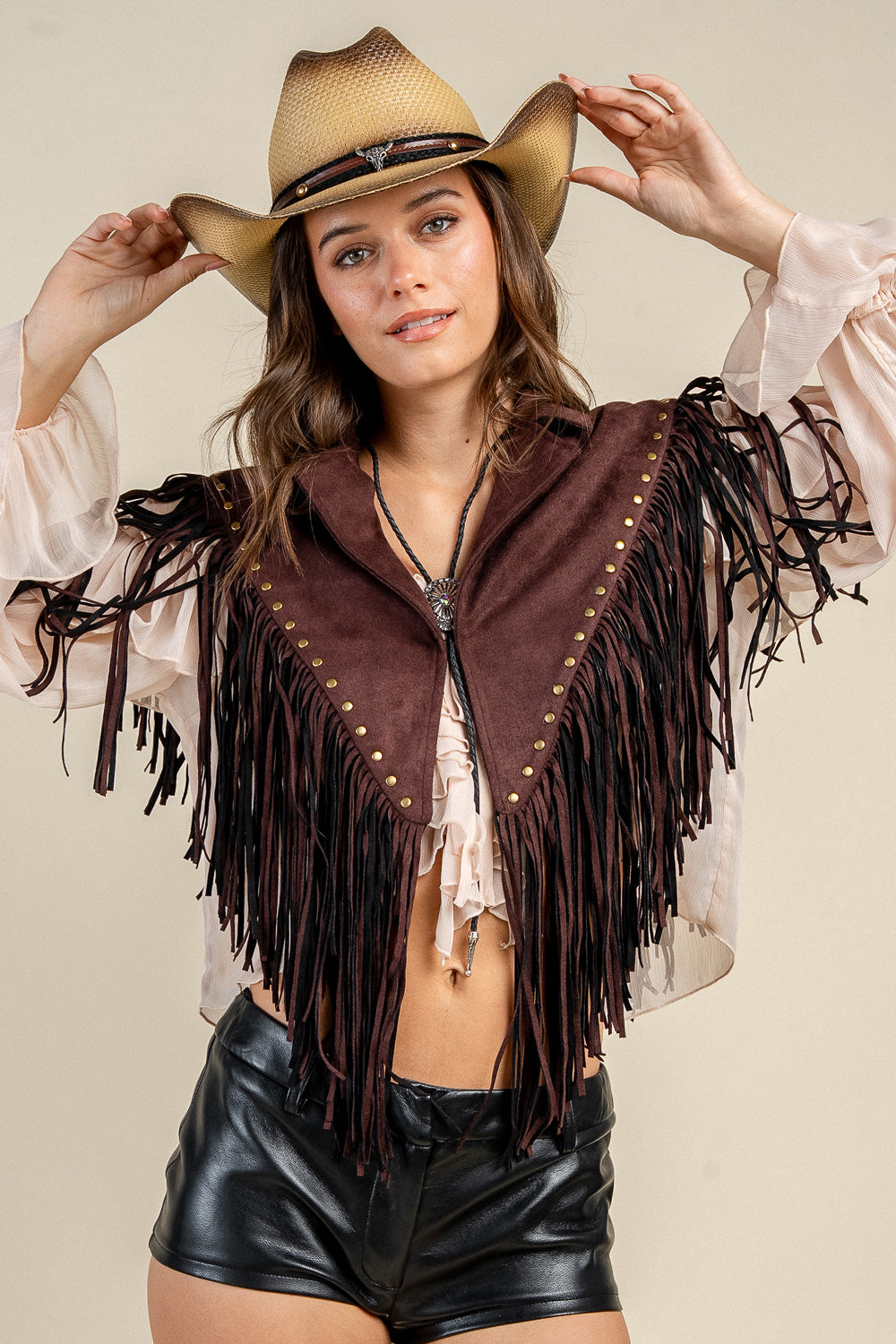 A BLANKET-STYLE WRAP JACKET WITH A STAR PATCH